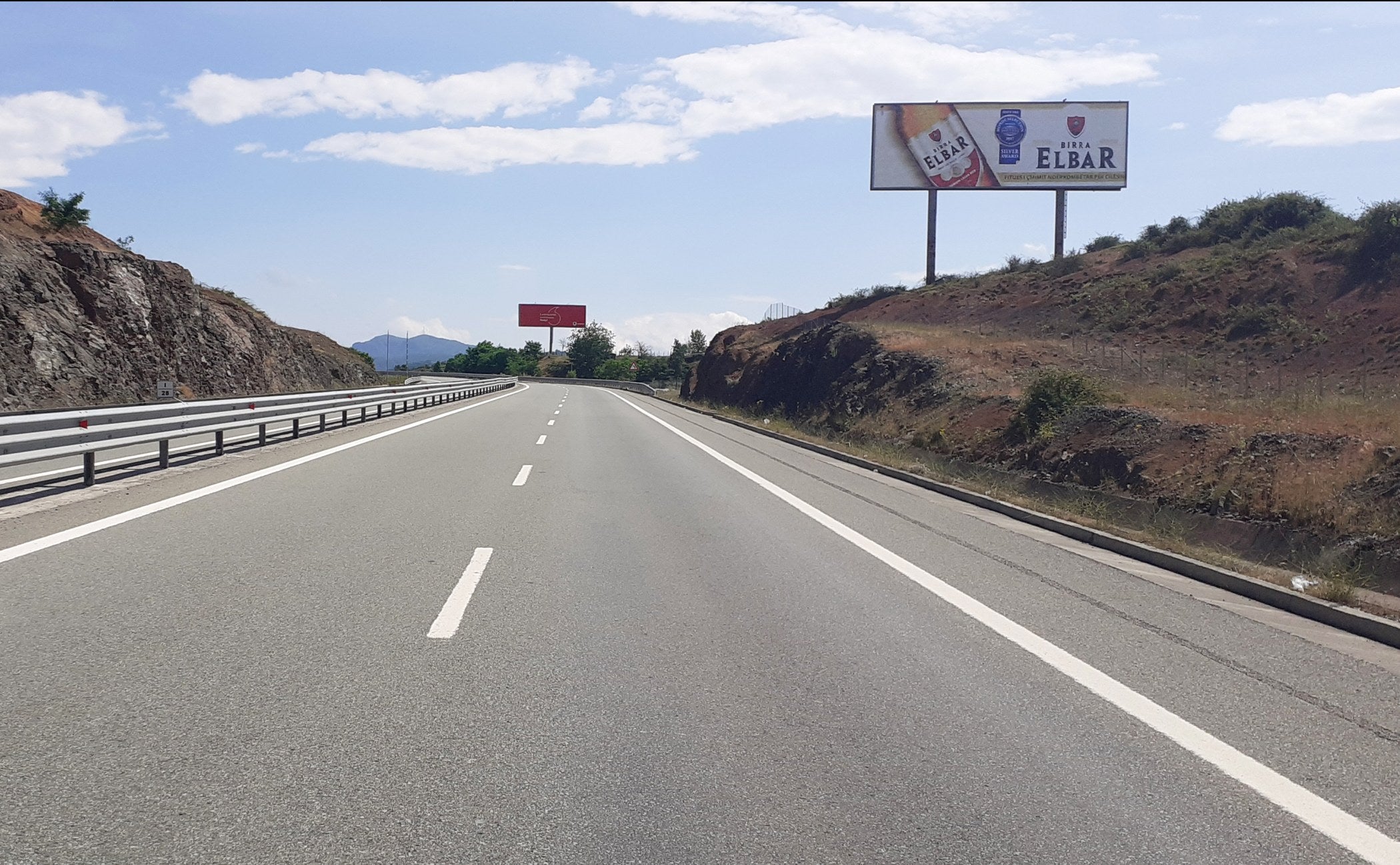Ground Billboard Aut. Milot-kalimash Mbikalimi Prane Kishes Koder, Tirana, Albania