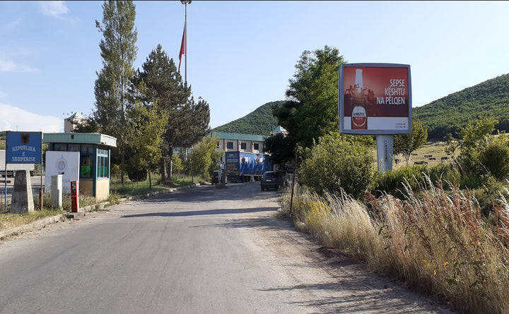 French Billboard Dogana Qafe Thane, Pogradec, Albania