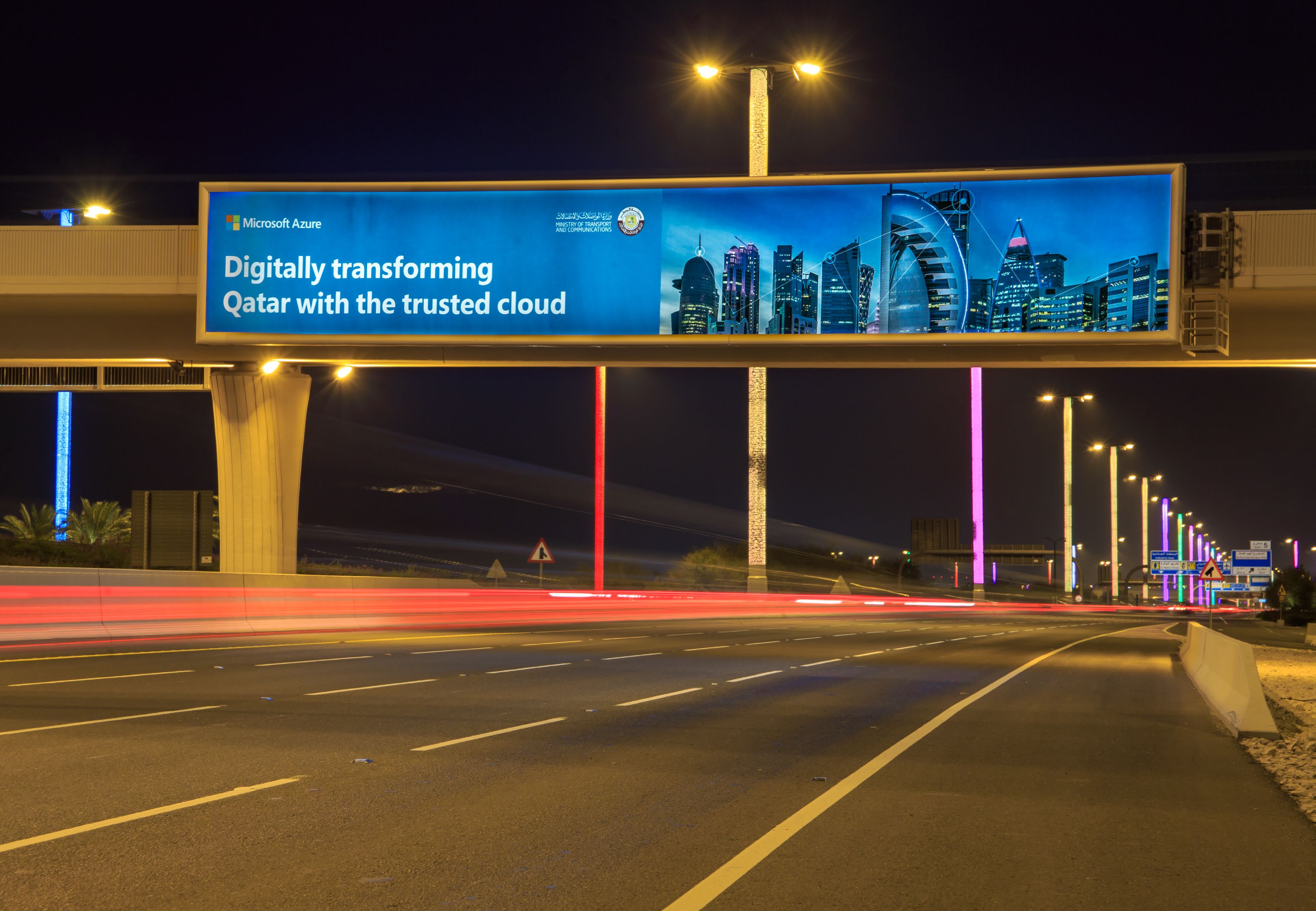 Digital bridge banner over the airport approach road, Doha