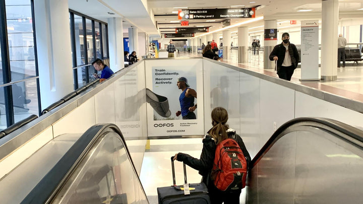 Overhead Baggage Escalator Banner (6256), Boston Logan Airport Terminal B, Boston