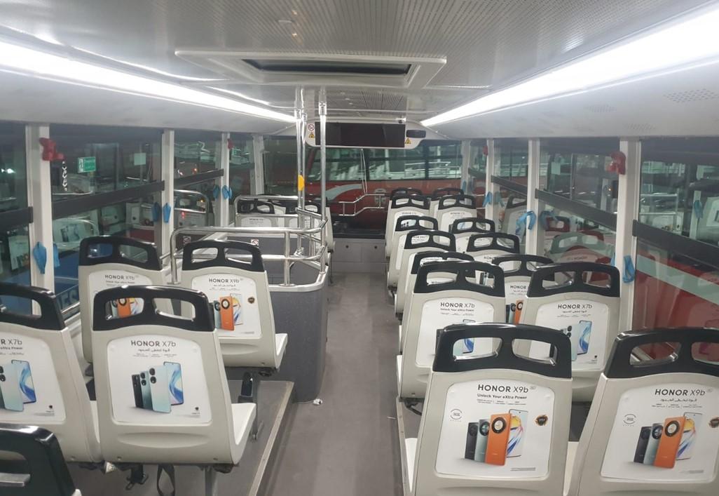 Double-decker bus interior advertising, Kuwait