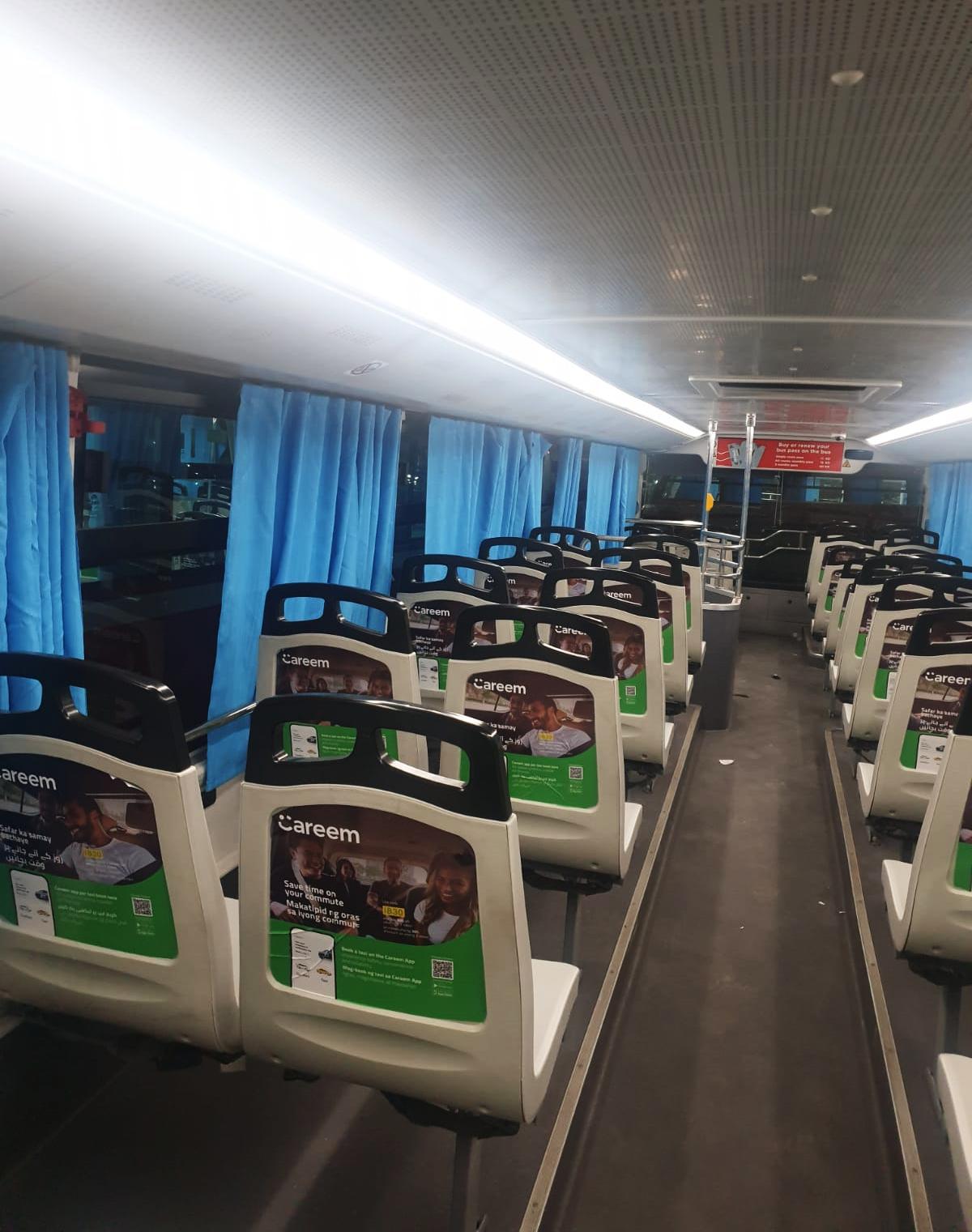Double-decker bus interior advertising network, Kuwait