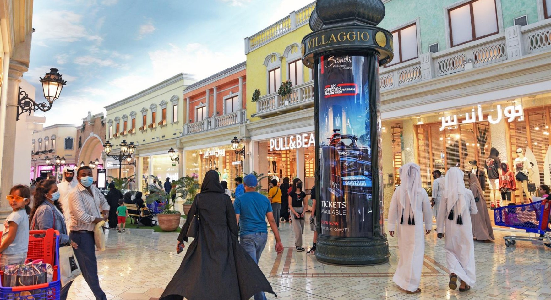 Villaggio Mall Majestic advertising column in the shopping concourse, Doha
